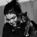 photo of emma johnson holding her cat abby